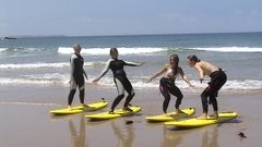 Surfing lessons at the west or south coast
